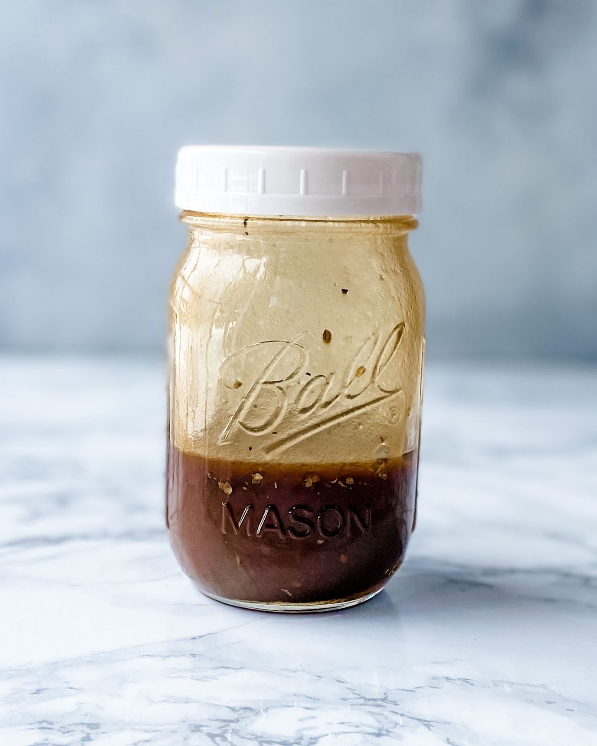 gluten-free balsamic dressing in a mason jar.