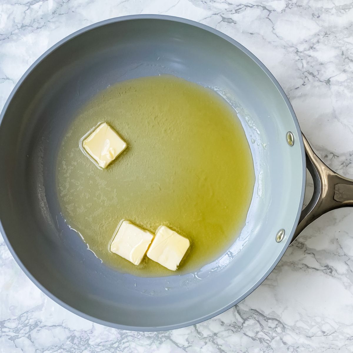 butter and olive oil in a skillet.