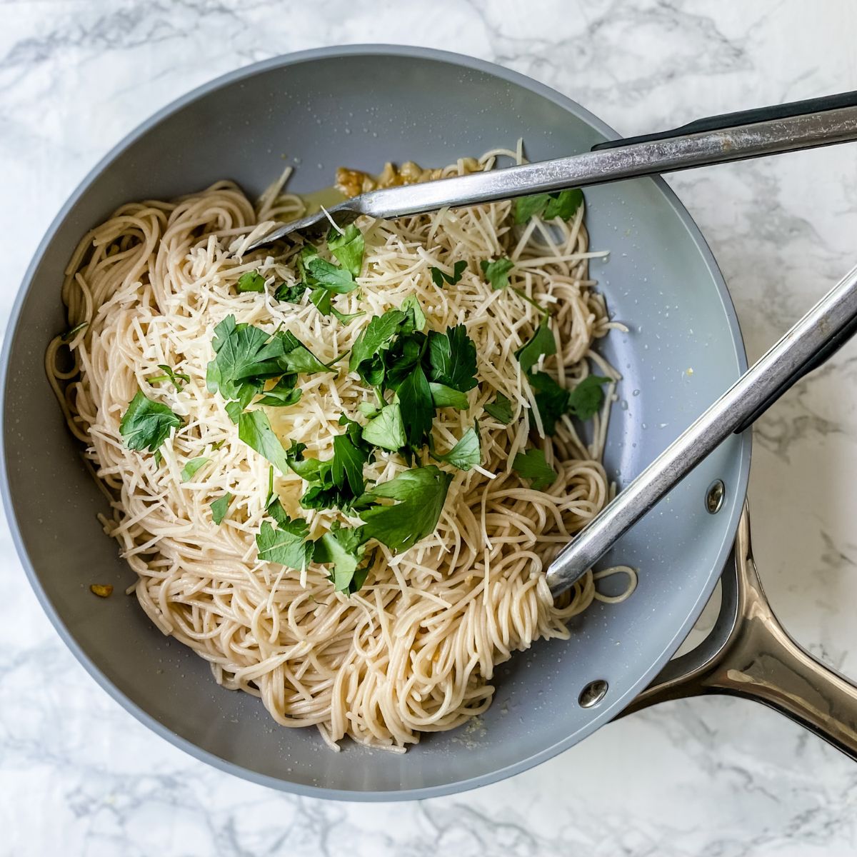 toss pasta with parmesan cheese, lemon juice and parsley.