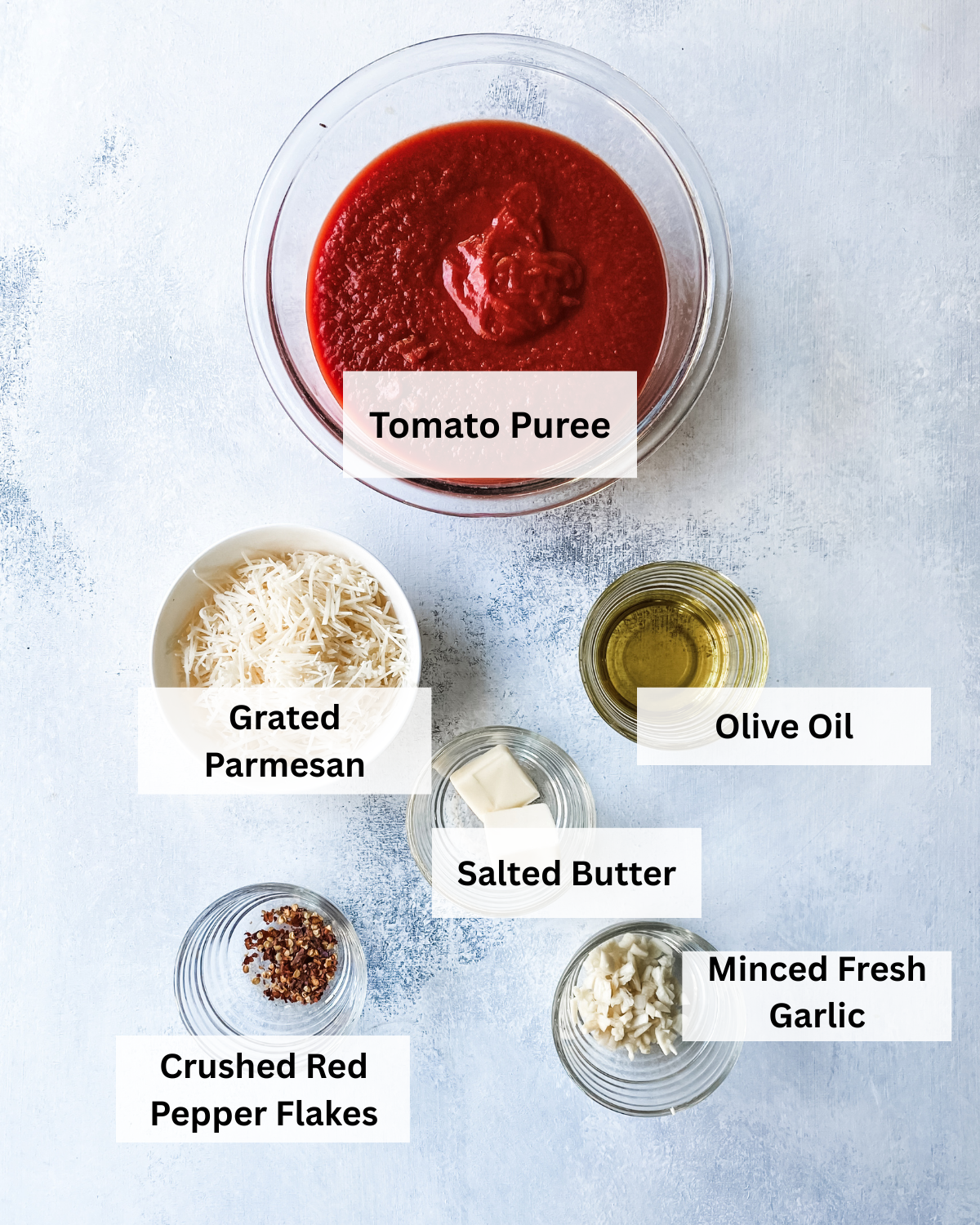 overhead picture of labeled ingredients for rose sauce.