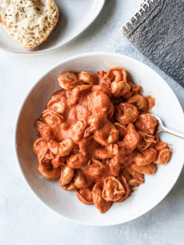 overhead image of tortellini with rose sauce