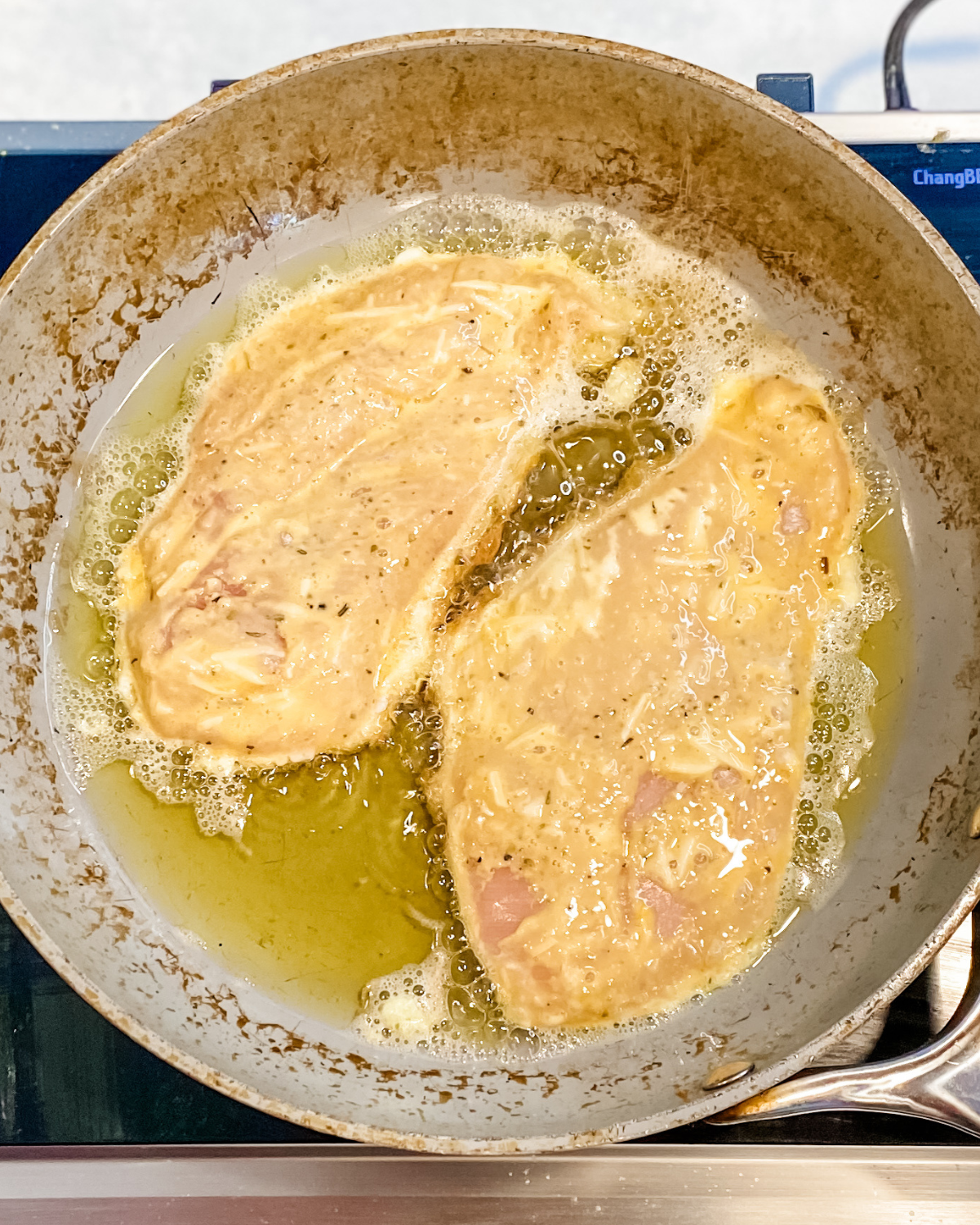 chicken egg batter side up in hot oil