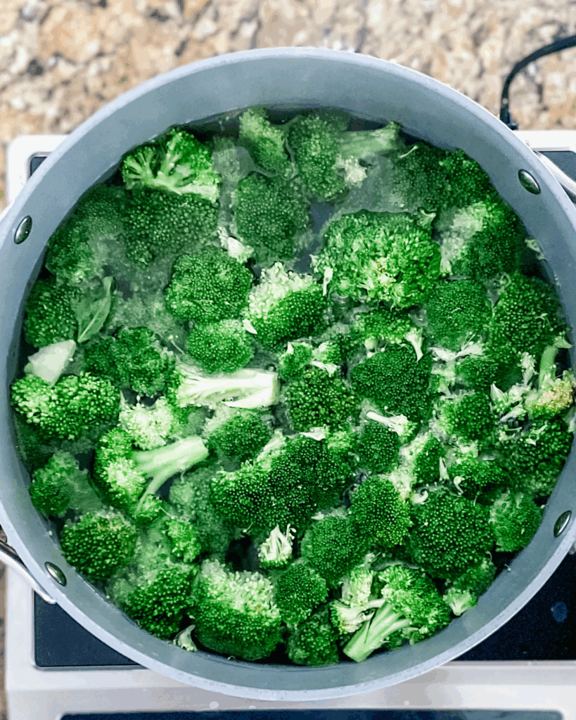 broccoli cooking in pot.